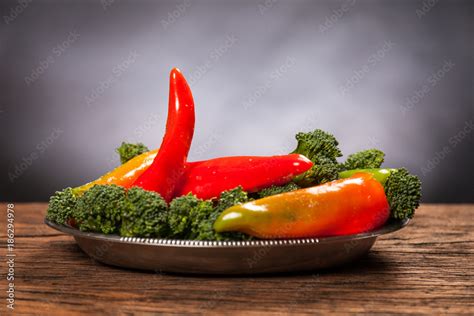 Sexy Food Red Hot Pepperoni With Broccoli Mischievous Affinity With Penis Foto De Stock