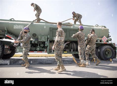 U S Marines With Marine Wing Support Squadron 171 Unravel A Fuel Hose