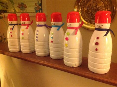 Snowmen Made From Coffee Creamer Containers Filled With Treats