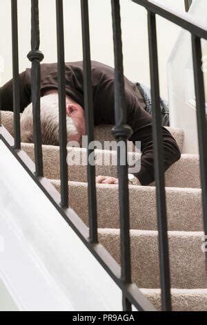 Senior Man Falling down Stairs Stock Photo: 220867371 - Alamy