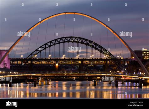 The iconic bridges over the River Tyne link Newcastle Upon Tyne to ...