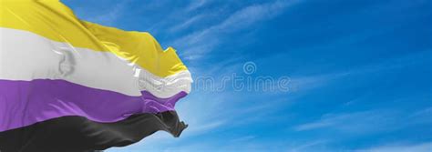 Nonbinary Flag Waving In The Wind At Cloudy Sky Freedom And Love