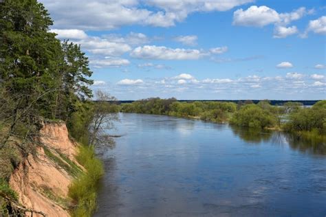 Premium Photo | Sandy ravine bank of a wide river