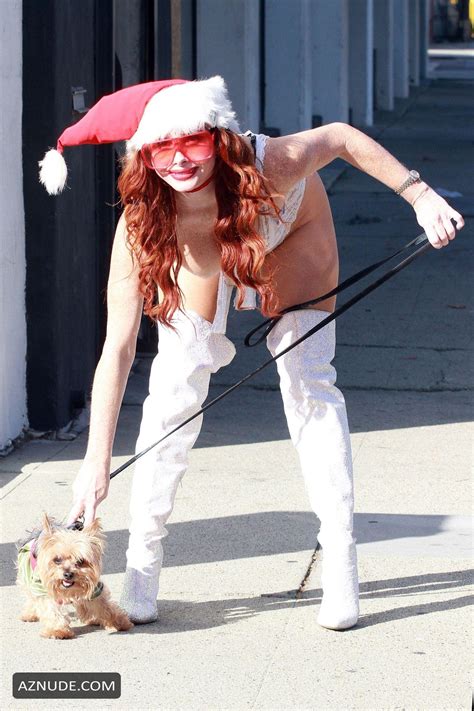 Phoebe Price Wearing A Santa Hat With A White Lingerie Outfit Aznude