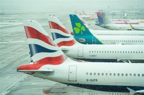 UK airport closes and airlines cancel flights as snow causes travel ...