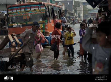 Sea water flooding Muara Baru area in Penjaringan, North Jakarta ...