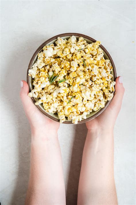 "Cheesy" Garlic Rosemary Popcorn - The Fit Peach