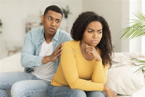 Sad Husband Calms Offended Upset Millennial African American Wife