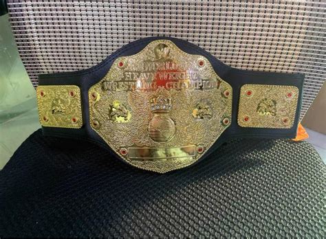 WWE World Heavyweight championship belt, Hobbies & Toys, Collectibles ...