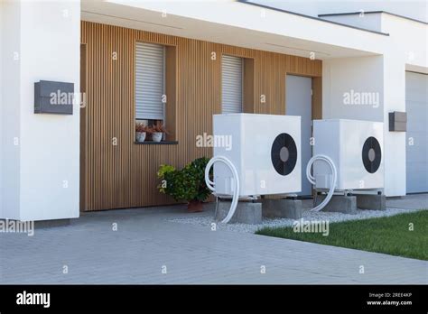 A Pair Of Air Source Heat Pumps An Eco Friendly Home Heating Solution