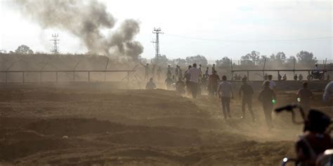 Palestinians Break Through Gaza Fence