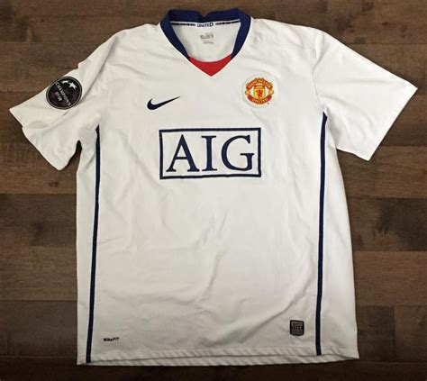 Manchester United Away football shirt 2008 - 2009. Sponsored by AIG