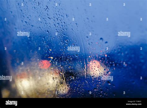 Night City Lights Through Windshield Abstract Background Water Drop On