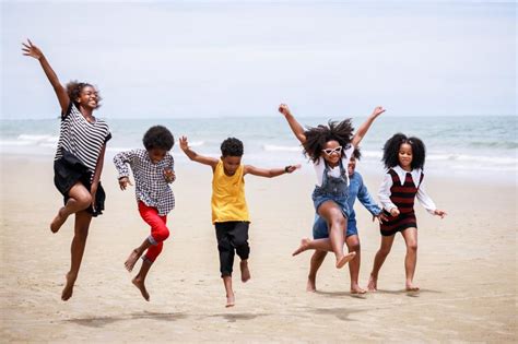 Free Stock Photo of Group of kids jumping for joy at the beach | Download Free Images and Free ...