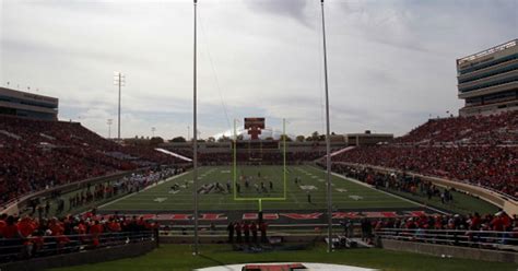 Winds Damage Texas Tech Stadium Lights - CBS DFW