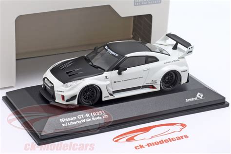 Solido 1 43 Nissan GT R R35 Liberty Walk Body Kit белый черный