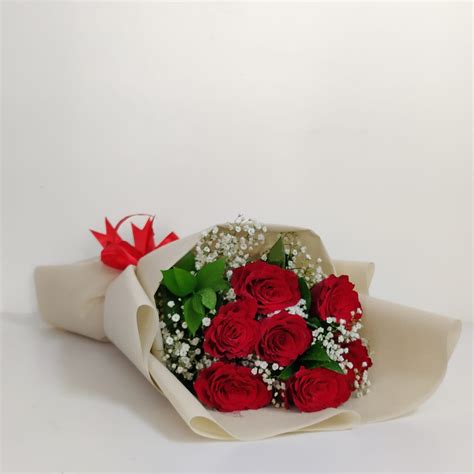 7 Red Roses Bouquet with Nice Wrapping for Free Delivery