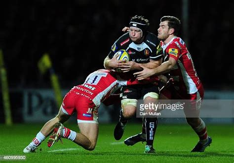 Thomas Waldrom Of Exeter Chiefs Is Tackled By Jonny May And Mark