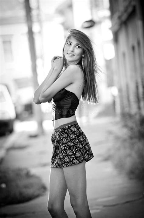 Cute Brunette With Short Skirt Posing On A City Street Stock Image Image Of Beauty Elegance