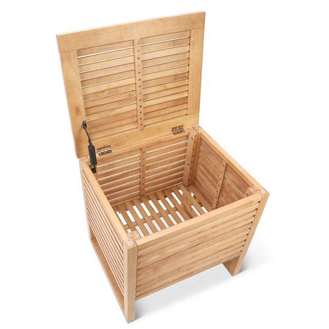 The Rubberwood Towel Hamper Hammacher Schlemmer