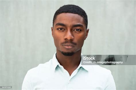 Close Up Serious African American Young Man Staring Stock Photo