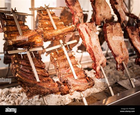 Asado, traditional barbecue dish in Argentina, roasted meat of beef ...