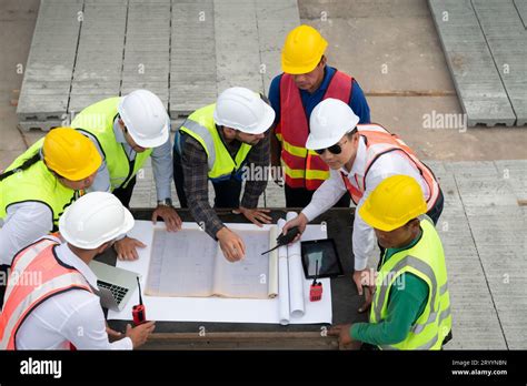 Construction Engineers Architects And Foremen Form A Group