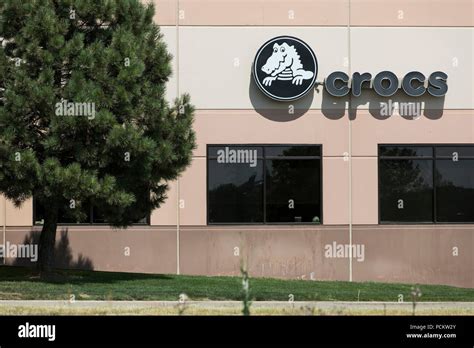 A Logo Sign Outside Of The Headquarters Of Crocs Inc In Niwot