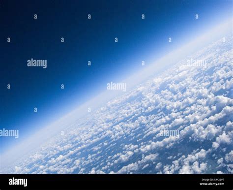 The Horizon And Clouds Of Planet Earth As Seen From High Above In This