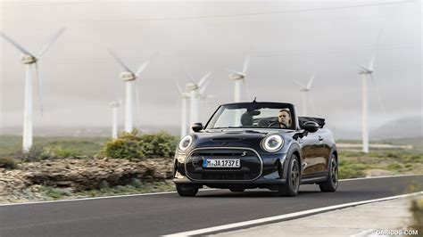 2023 MINI Cooper SE Convertible - Front Three-Quarter | Caricos