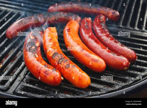 Traditional German Barbecue Bratwurst Sausages Offered As Close Up On A