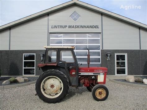 INTERNATIONAL 384 Med lukket Sekura kabine på Ciągnik kołowy ...