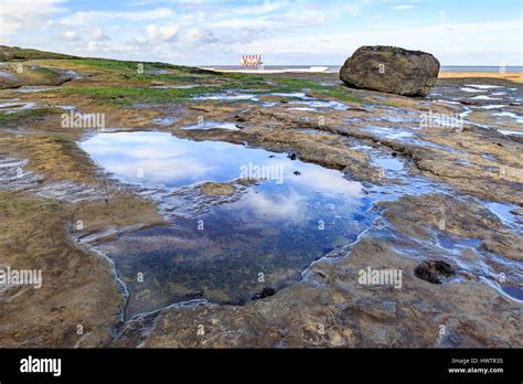 STAITHES, ENGLAND - MARCH 1: HDR image of Staithes beach and rockpools ...