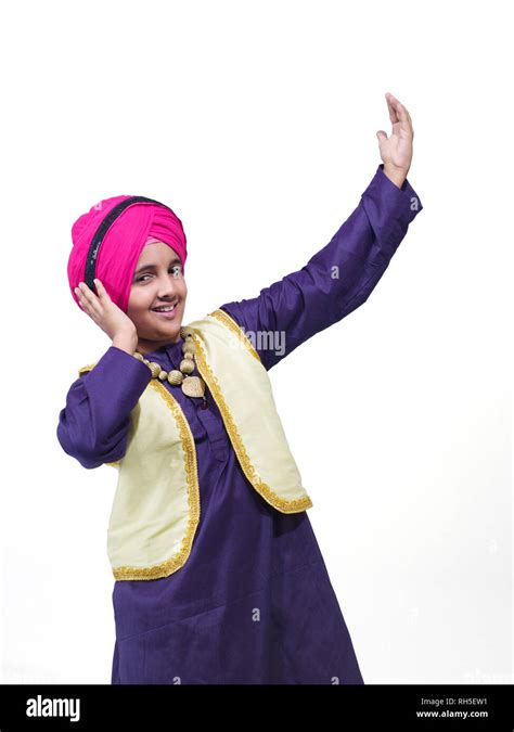 PORTRAIT OF A SIKH SARDAR YOUNG BOY DANCING THE BANGRA DANCE IN ...