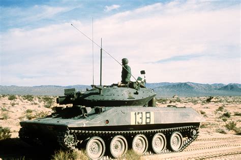 A Soldier Stands Up In The Turret Of An M 551 Sheridan Light Tank