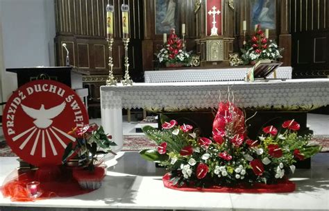 Beautiful Altar Arrangement With Red Flowers And White Poinsettias