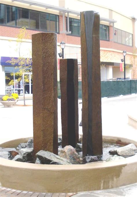 Custom Basalt Fountain Polished Sides Cascade Stoneworks