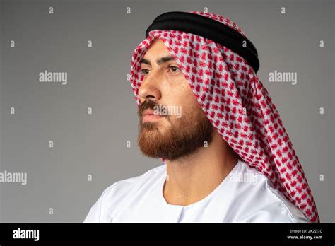 Portrait Of Young Arab Man On Gray Background In Studio Stock Photo Alamy