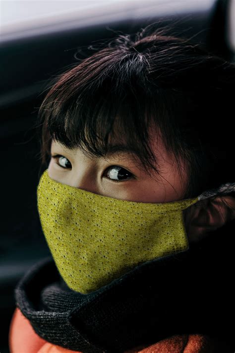 Woman Wearing A Face Mask Mockup