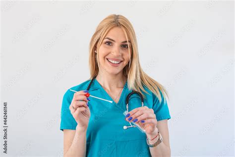 Female Caucasian Doctor Holding A Swab Collection Stick Nasal And Oral