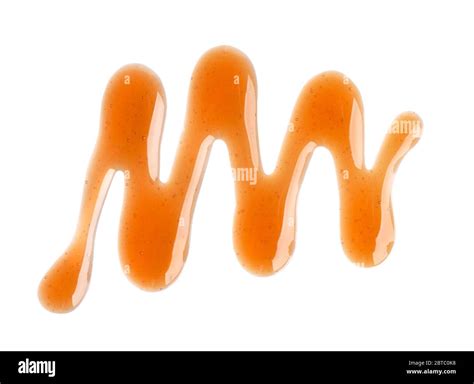 Caramel Syrup Drizzle Isolated On White Background Splashes Of Sweet