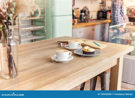 A Table Setting for Coffee on the Counter at a Coffee House Stock Image ...