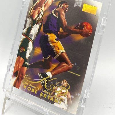 1998 99 Skybox Premium Vintage Kobe Bryant Gold Holo Script Print