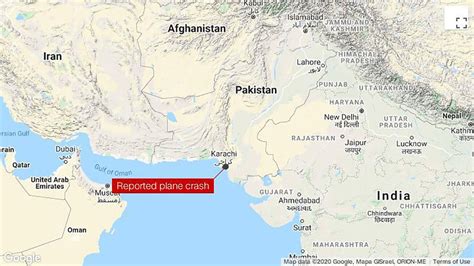 Karachi Crash Pakistani Airliner Crashes With Over 100 On Board Cnn