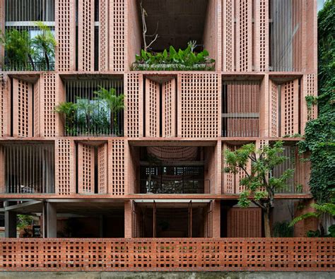 Tropical Space Encloses Premier Office With A Porous Brick Facade