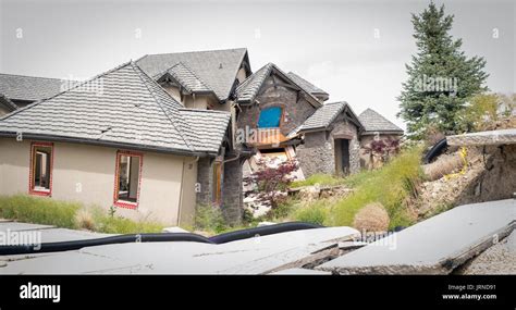 Condemned house falling down to the ground slowly Stock Photo - Alamy