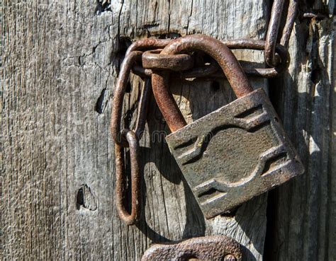 Old Padlock A Rusty Lock Locks The Wooden Door Stock Photo Image Of