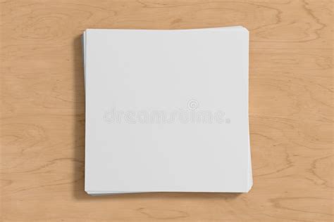 Stack Of Square Sheets Of Paper On The Wooden Table Stock Illustration