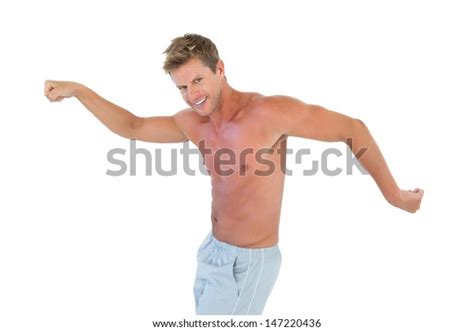 Shirtless Man Showing His Muscles On Stock Photo 147220436 Shutterstock