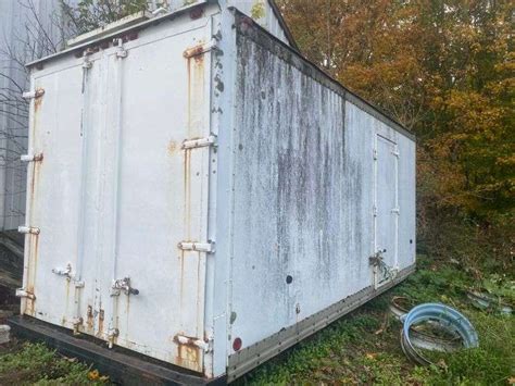 Truck Box with motor/truck parts - Gregg Auctions